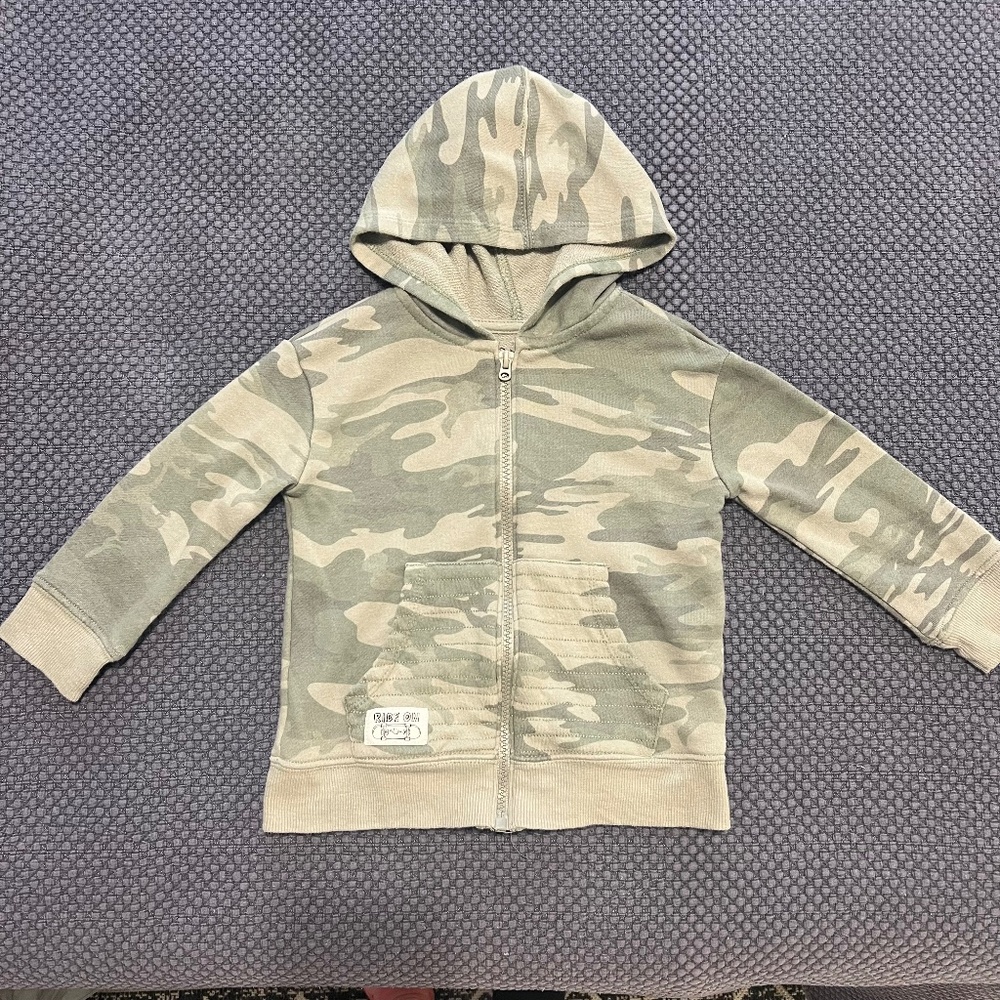 Zip up hoodie.